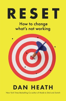 Book cover of 'Reset' by Dan Heath with a target and arrow on a yellow background